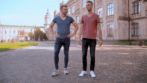 Laughing guys speaking about some funny Stock Footage 99866540