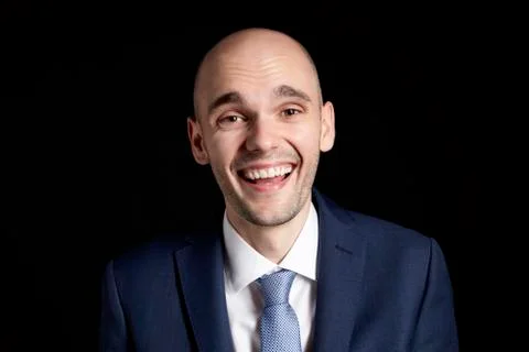 Laughing Man on Black Background Photos