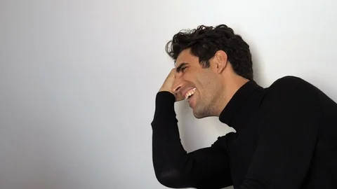 Laughing man in black Stock-Footage 89560514