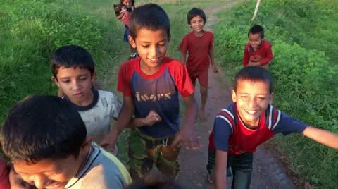 Laughing nepali and refugee tibetan children and pursuing the camera. Stock Footage
