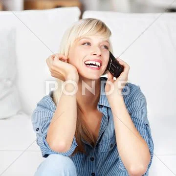 Laughing woman on phone Stock Photos