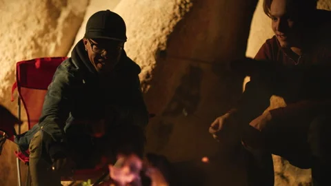 Laughter and Marshmallow Making on the Fourth of July in Joshua Tree, California Stock Footage 243632817