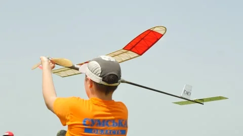 Launch of an Aircraft Model With Rubber Engine Boy Holding His Model Aircraft Stock Footage 64580276