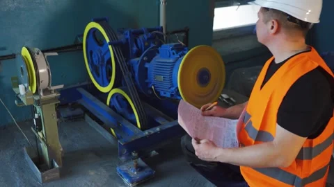 Launch and technical inspection of elevator equipment after repair. Engineer Video stock 265258167
