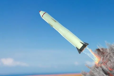 Launch of nuclear missile against blue sky. 3D rendered illustration. Stock Photos