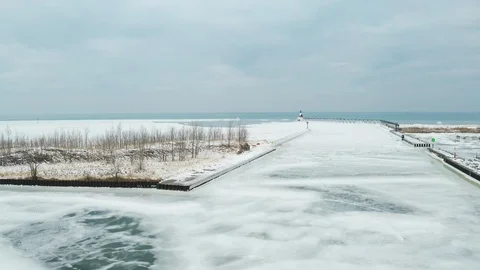 Launch over Lighthouse and Open Water Stock Footage 108132012