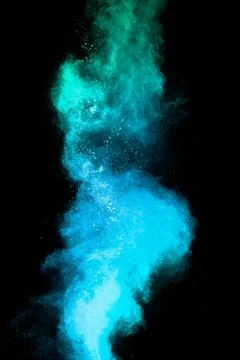 Launched blue dust particles splashing.Bizarre forms of blue powder explosi.. 스톡 사진