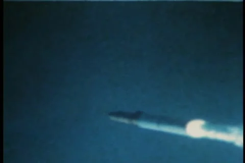 Launched torpedoes exploding in ocean Stock Footage 11354577