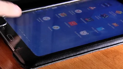 Launching and flipping pages on a tablet Stock-Footage 72849702