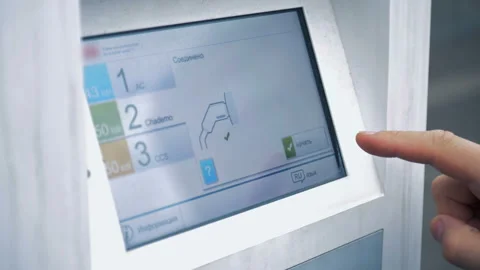 Launching of recharging process of a battery-driven car through a digital Stock Footage 98594250