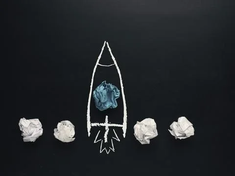 Launching rocket of paper balls, creativity concept or new ideas metaphor, start Foto stock