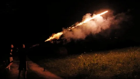Launching Roman Candles into a Field in Rural America Stock Footage 104154053