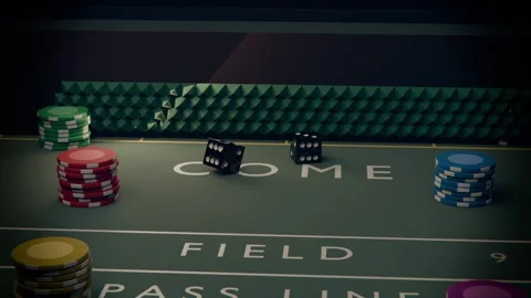 Launching two black dice across craps table, tumbling over COME toward chip Stock Footage 340268354