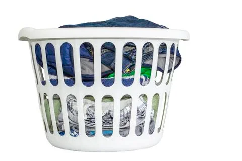Laundry basket with clothes Stock Photos