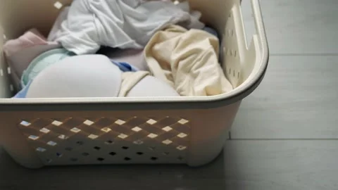 Laundry. Basket for dirty Laundry, the preparation for a big wash, top view. whi Video stock 131731806