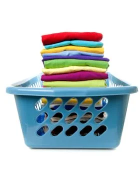 Laundry basket with folded clothes Foto stock