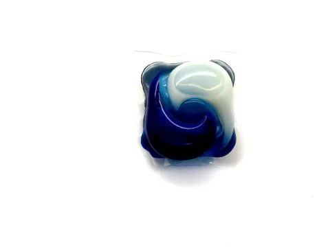 Laundry capsule isolated on white background. Stock Photos