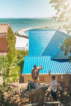 Laundry, clothes and high five with men in outdoor for sunshine, linen and Stock Photos
