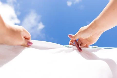 Laundry day. Drying laundry outside. Stock Photos