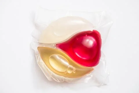 Laundry detergent pod on white background Stock Photos