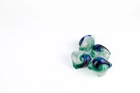 Laundry detergent pods on white background. Close-up of colorful washing de.. Stock Photos