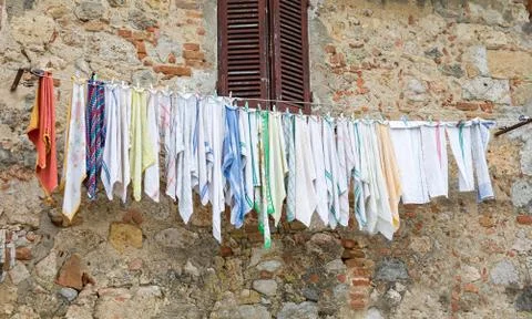Laundry Drying on a Clothesline in Tuscany Stock Photos