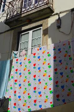 Laundry drying on the facade of the house Stock-Fotos