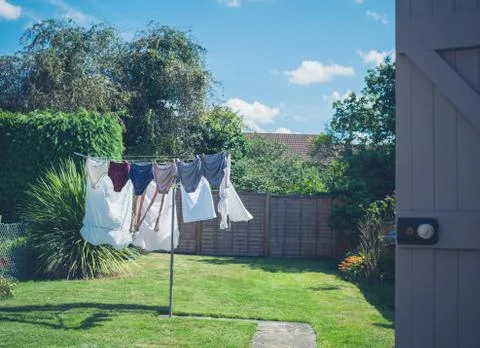 Laundry drying in garden Stock Photos