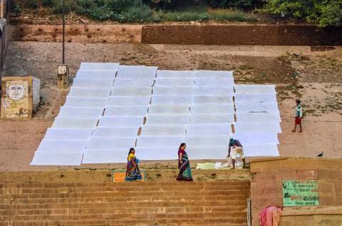 Laundry Drying On the Ghat Steps At Start of Day Stock Photos