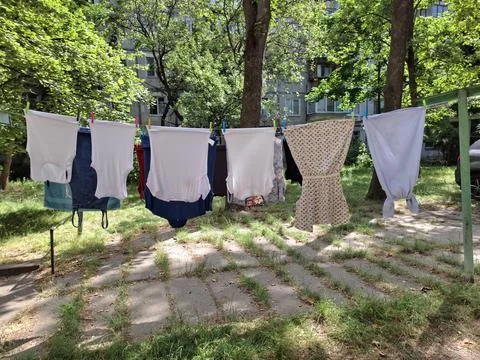 Laundry drying in open air Stock Photos