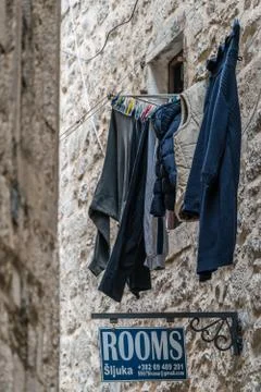 Laundry drying outside hostel in Kotor Stock Photos
