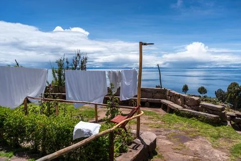 Laundry drying under the sun on Taquile Island, Lake Titicaca, Peru Stock Photos