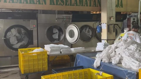 Laundry factory activity at Jakarta Stock Footage 285910393