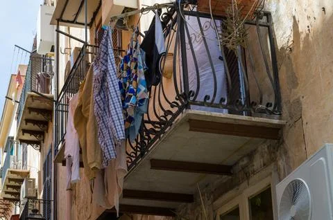 Laundry hanging on the balcony. Stock-Fotos