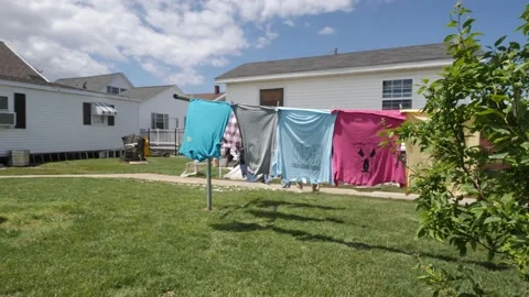 Laundry Hanging on Clothesline in Sunshine Stock Footage 199806287