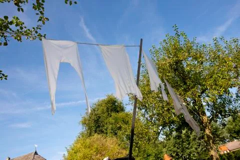 Laundry hanging outside Stock Photos