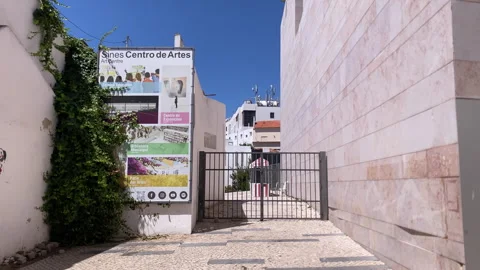 Laundry hanging outside stone building in Portuguese village Stock Footage 341298289