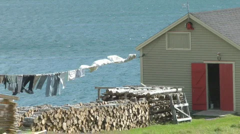 Laundry Hanging On A Washing Line Near The Sea In Newfoundland Canada Stock Footage