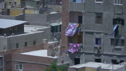 Laundry Hanging From Windows In Cairo, Egypt Stock Footage 157950631