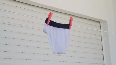 Laundry line with child underpants Video stock 114611351