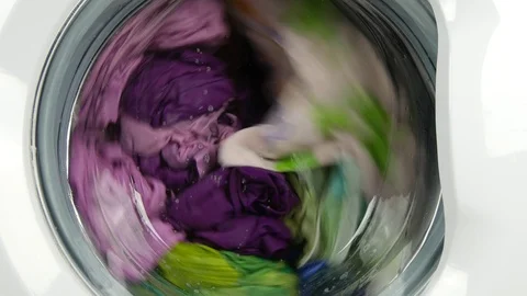 Laundry Machine Spinning and Clean Wet Clothes with Water and Detergent Stock-Footage 113633151