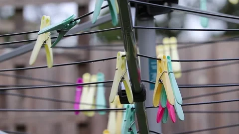 Laundry pegs on a line blowing in the wind Video stock 138027585