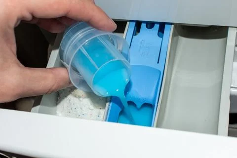 Laundry rinse in the washing machine Stock Photos