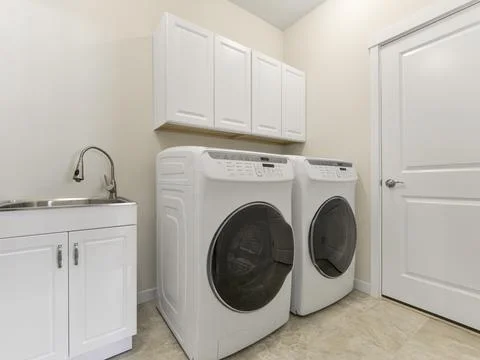 Laundry room interior Stock Photos