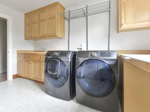Laundry room interior Stock Photos