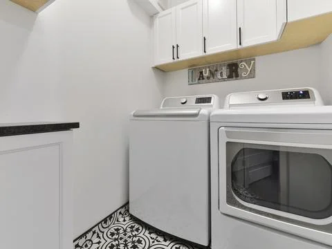 Laundry room interior Stock Photos