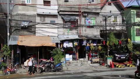 Laundry store in housing complex Malate district Manila Stock Footage 156725098