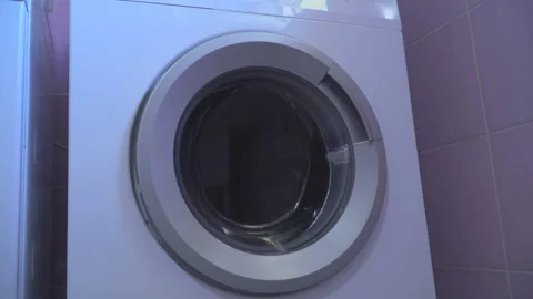 Laundry in washing machine Stock Footage 145425128