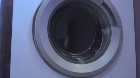 Laundry in washing machine Stock Footage 145793122