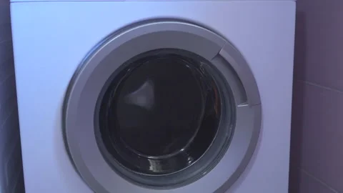 Laundry in washing machine Stock Footage 145793391